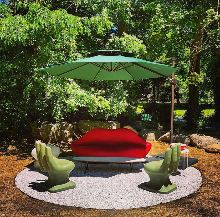 Surrealist vignette featuring the Heller Bocca Sofa designed in 1971 by Studio 65.
